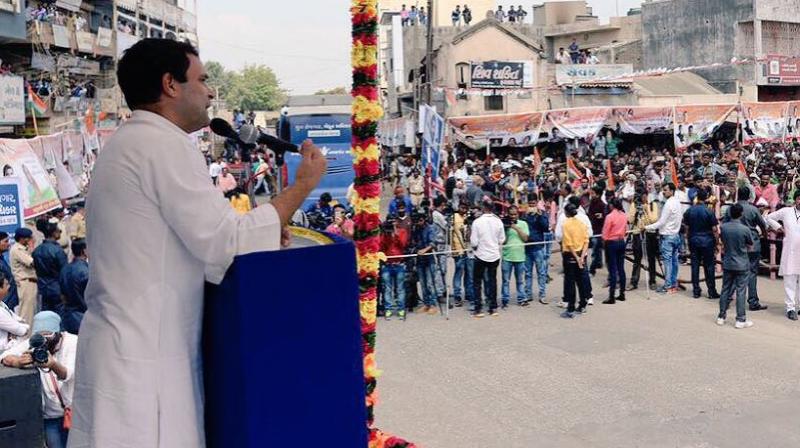 At Falla village in Jamnagar, people greeted him with the slogan 'Jai Sardar, Jai Patidar'. Many in the crowd wore caps with the slogan. (Photo: OfficeofRG | Twitter) At Falla village in Jamnagar, people greeted him with the slogan 'Jai Sardar, Jai Patidar'. Many in the crowd wore caps with the slogan. (Photo: OfficeofRG | Twitter)