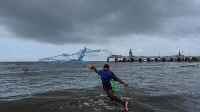 A fisherman does fishing ahead of southwest monsoon at a seaside in Kochi, Saturday, May 29, 2021. (PTI Photo)