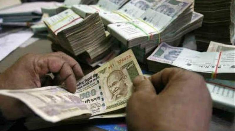 The political parties depositing scrapped Rs 500 and Rs 1000 notes in their accounts will be exempt from income tax only if they are registered, the FM said. (Photo: PTI/File) The political parties depositing scrapped Rs 500 and Rs 1000 notes in their accounts will be exempt from income tax only if they are registered, the FM said. (Photo: PTI/File)