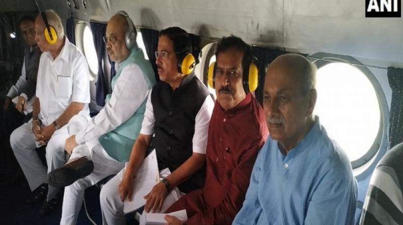 At least 24 people have lost their lives while around 1,024 villages in 80 talukas of 17 districts have been affected due to floods caused by incessant rains in the region, according to the Chief Minister Yediyurappa. (Photo: ANI) At least 24 people have lost their lives while around 1,024 villages in 80 talukas of 17 districts have been affected due to floods caused by incessant rains in the region, according to the Chief Minister Yediyurappa. (Photo: ANI)