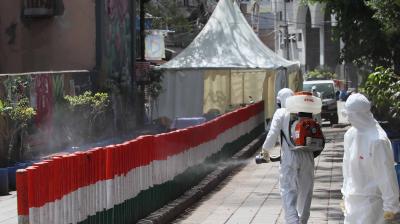 Health workers sanitize the area near the Nizamuddin mosque after people who attended a religious congregation organised by the Tablighi Jamaat where Covid-19 positive persons spread the virus to other participants. (DC Photo: Pritam Bandyopadhyay)
