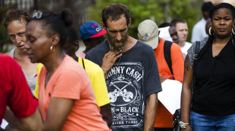 In this Monday, July 24, 2017 photo, Steven Kemp, who is addicted to heroin and is homeless, waits in line for help from a Philly Restart representative to obtain an identification card in Philadelphia, Monday, July 24, 2017. (Photo: AP) In this Monday, July 24, 2017 photo, Steven Kemp, who is addicted to heroin and is homeless, waits in line for help from a Philly Restart representative to obtain an identification card in Philadelphia, Monday, July 24, 2017. (Photo: AP)