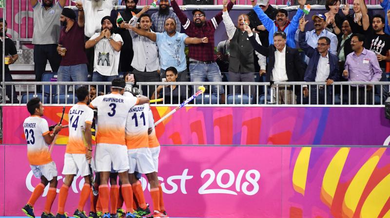 India's wait for an equaliser finally ended in the 33rd minute when skipper Manpreet struck from the top of the circle after a good assist from Mandeep, who couldn't take a shot on goal himself with two English defenders tackling him. (Photo: AFP) India's wait for an equaliser finally ended in the 33rd minute when skipper Manpreet struck from the top of the circle after a good assist from Mandeep, who couldn't take a shot on goal himself with two English defenders tackling him. (Photo: AFP)