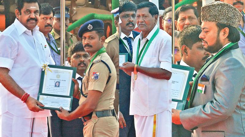 Chief Minister Edappadi K. Palaniswami presents awards to (left -ight) K. Shanmugam, R. Munuswamy and Sadiq Basha during the Republic Day celebrations in the city on Friday. (photo: DC) Chief Minister Edappadi K. Palaniswami presents awards to (left -ight) K. Shanmugam, R. Munuswamy and Sadiq Basha during the Republic Day celebrations in the city on Friday. (photo: DC)