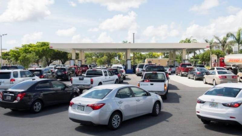Lines of cars snaked around those gas stations that remained open in Miami, as Florida prepared for Hurricane Irma. (Photo: AFP) Lines of cars snaked around those gas stations that remained open in Miami, as Florida prepared for Hurricane Irma. (Photo: AFP)