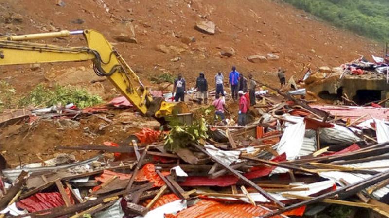 Mudslides and torrential flooding has killed many people in and around Sierra Leone's capital early Monday following heavy rains, with many victims thought to be trapped in homes buried under tons of mud. Mudslides and torrential flooding has killed many people in and around Sierra Leone's capital early Monday following heavy rains, with many victims thought to be trapped in homes buried under tons of mud.
