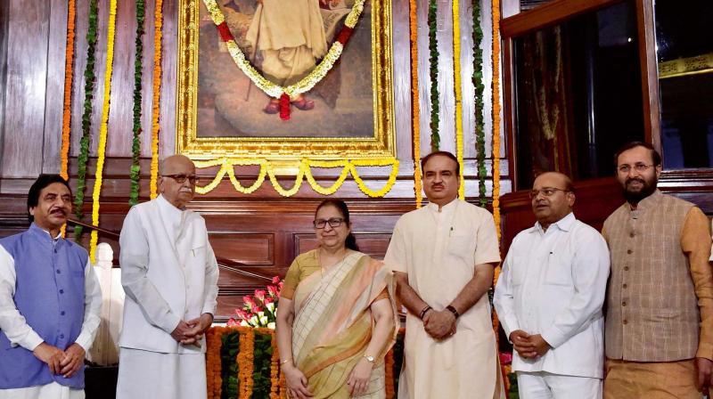 Lok Sabha Speaker Sumitra Mahajan, senior BJP leader L.K. Advani, Union ministers Prakash Javadekar, Ananth Kumar and others pose after paying tributes to Lokmanya Bal Gangadhar Tilak on his birth anniversary at Parliament in New Delhi (Photo: AP) Lok Sabha Speaker Sumitra Mahajan, senior BJP leader L.K. Advani, Union ministers Prakash Javadekar, Ananth Kumar and others pose after paying tributes to Lokmanya Bal Gangadhar Tilak on his birth anniversary at Parliament in New Delhi (Photo: AP)