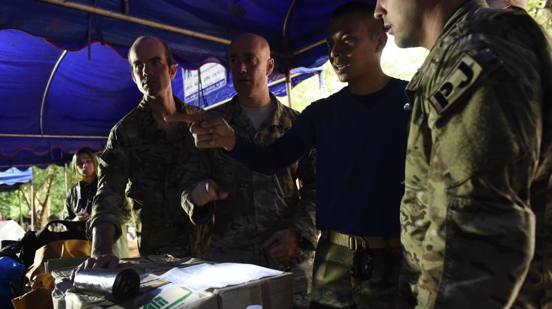 US forces and British divers have arrived in Thailand to help in the search for 12 schoolboys and their soccer coach believed trapped by floodwaters in a cave. (Photo: AFP) US forces and British divers have arrived in Thailand to help in the search for 12 schoolboys and their soccer coach believed trapped by floodwaters in a cave. (Photo: AFP)