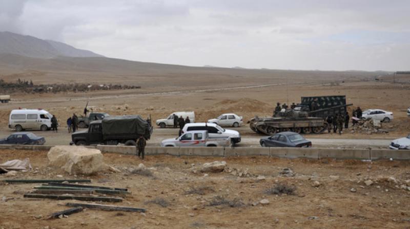 Syrian forces take up positions during fighting between Government forces and Islamic State group militants in the ancient city of Palmyra, near Homs, Syria. (Photo: AP) Syrian forces take up positions during fighting between Government forces and Islamic State group militants in the ancient city of Palmyra, near Homs, Syria. (Photo: AP)