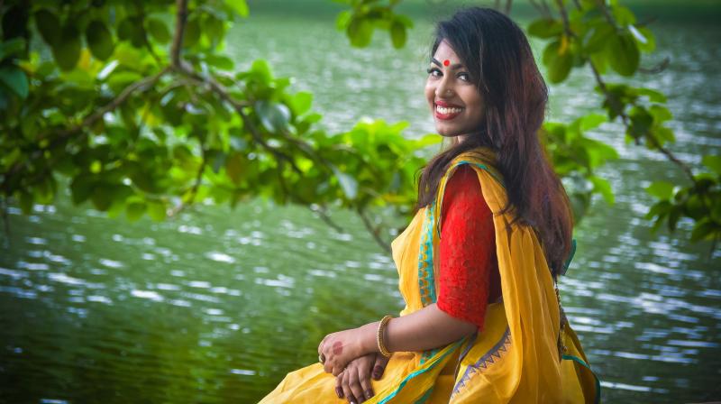 It is a similar blue colour to the team’s jersey colour and has a thin saffron border along the ‘pallu’. (Photo: Representational/Pexels) It is a similar blue colour to the team’s jersey colour and has a thin saffron border along the ‘pallu’. (Photo: Representational/Pexels)