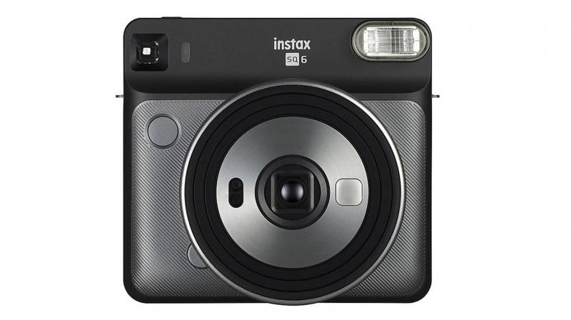 The Fujifilm Instax SQUARE SQ6 instant camera is priced at Rs 9,999 and features in Pearl White, Blush Gold and Graphite Gray variants. The Fujifilm Instax SQUARE SQ6 instant camera is priced at Rs 9,999 and features in Pearl White, Blush Gold and Graphite Gray variants.