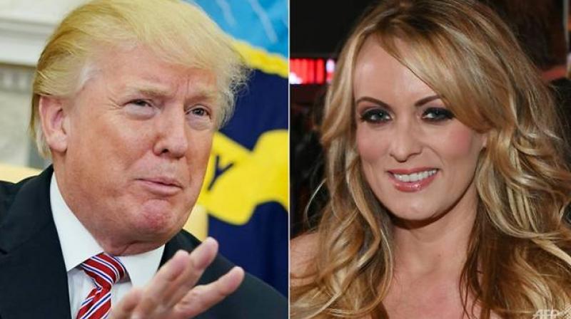 Daniels, whose real name is Stephanie Clifford, claims she had a tryst with Trump in 2006 while he was married. The president denies the affair, and initially denied all knowledge of the payment. (Photo: AFP) Daniels, whose real name is Stephanie Clifford, claims she had a tryst with Trump in 2006 while he was married. The president denies the affair, and initially denied all knowledge of the payment. (Photo: AFP)