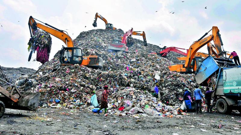 Not only is unprocessed waste lying all around but even new waste is added.   DC Image/P. Surendra