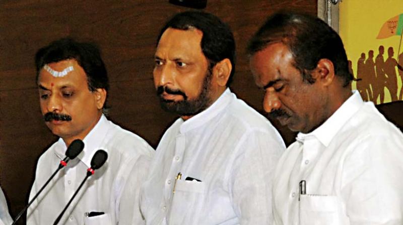 BJP MLA Laxman Savadi and MLC N. Ravikumar address the media in Bengaluru on Monday BJP MLA Laxman Savadi and MLC N. Ravikumar address the media in Bengaluru on Monday