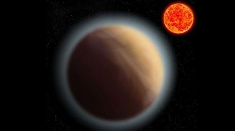 Scientists say the planet, GJ 1132b, could possibly be a 'water world' with an atmosphere of hot stream (Photo: MPIA) Scientists say the planet, GJ 1132b, could possibly be a 'water world' with an atmosphere of hot stream (Photo: MPIA)