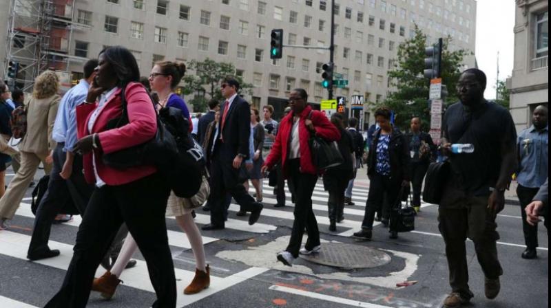 US job losses surge as 6.6 million workers apply for unemployment aid. (Photo- AFP)