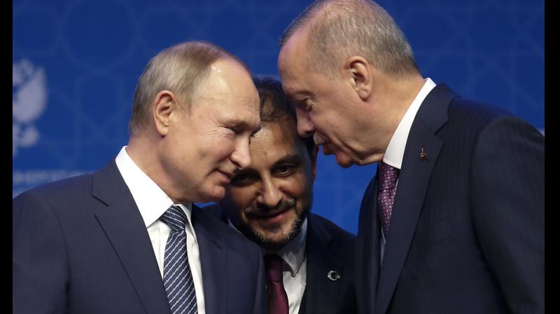 Turkeys President Recep Tayyip Erdogan, right and Russias President Vladimir Putin, left