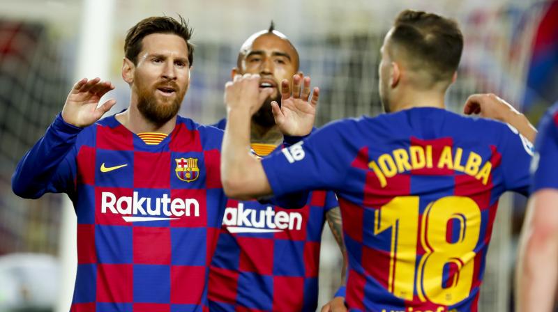 Barcelonas Jordi Alba, right, celebrates with Barcelonas Lionel Messi (AP) Barcelonas Jordi Alba, right, celebrates with Barcelonas Lionel Messi (AP)