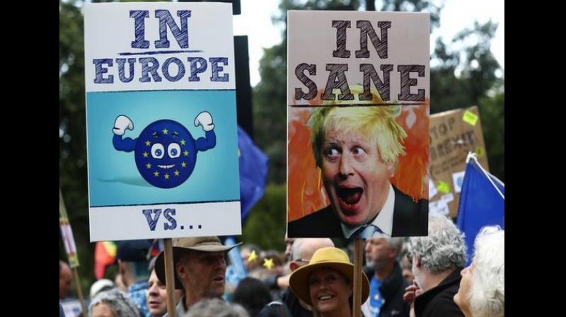 The protestors heralded banners, posters and raised the slogan "No to Boris, yes to Europe." (Photo: ANI) The protestors heralded banners, posters and raised the slogan "No to Boris, yes to Europe." (Photo: ANI)