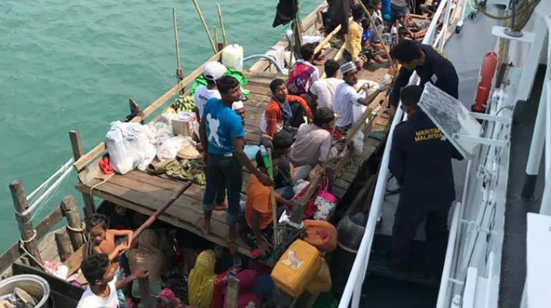 The vessel carrying 56 people was intercepted by Malaysian maritime authorities near the northwestern island of Langkawi (Photo: AFP) The vessel carrying 56 people was intercepted by Malaysian maritime authorities near the northwestern island of Langkawi (Photo: AFP)