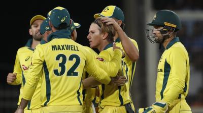 Adam Zampa celebrates the dismissal of Virat Kohli during the third ODI. (Photo: AP)