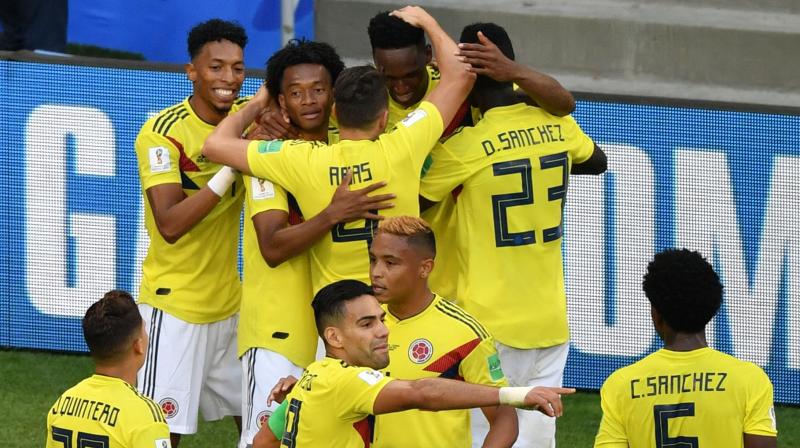 Yerry Mina scored the only goal. The 6-foot-5 (1.95-meter) Barcelona defender leapt above a pair of Senegalese defenders to head the ball hard off the ground, off Senegal goalkeeper Khadim Ndiaye's hand and into the net, sending the enthusiastic Colombian fans at Samara Stadium into a frenzy. (Photo: AFP) Yerry Mina scored the only goal. The 6-foot-5 (1.95-meter) Barcelona defender leapt above a pair of Senegalese defenders to head the ball hard off the ground, off Senegal goalkeeper Khadim Ndiaye's hand and into the net, sending the enthusiastic Colombian fans at Samara Stadium into a frenzy. (Photo: AFP)