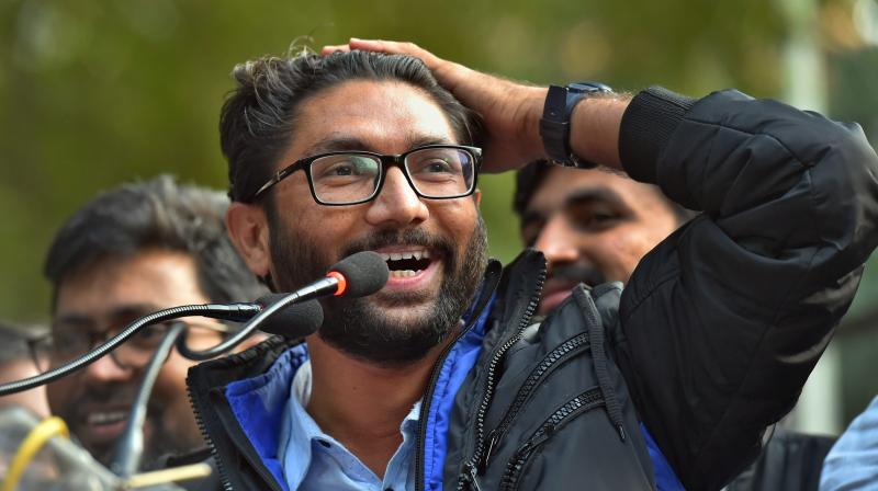 Dalit leader and Gujarat MLA Jignesh Mevani addresses the 'Youth Hunkar' rally in New Delhi on Tuesday. (Photo: PTI) Dalit leader and Gujarat MLA Jignesh Mevani addresses the 'Youth Hunkar' rally in New Delhi on Tuesday. (Photo: PTI)