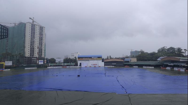 The entire P. Sara Oval ground remained covered under overcast skies. (Photo: AP) The entire P. Sara Oval ground remained covered under overcast skies. (Photo: AP)