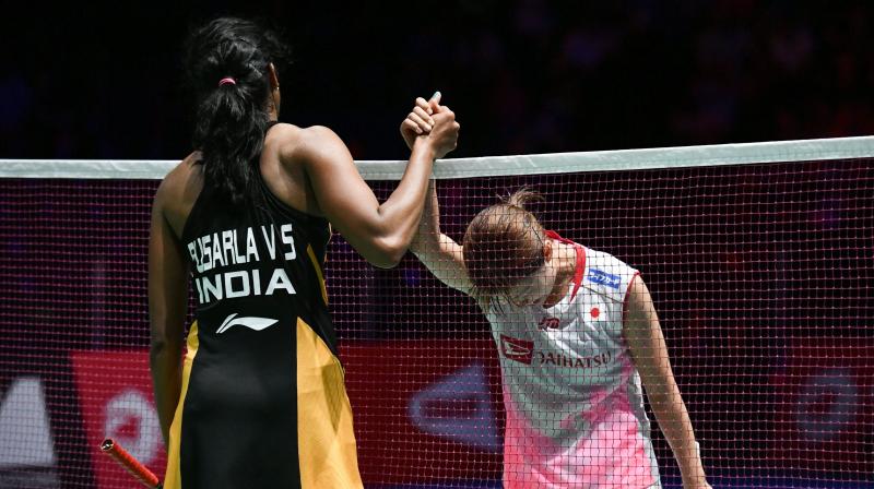 Sindhu trounced Japan's Nozomi Okuhara 21-7, 21-7 in the final of the tournament and became the first Indian shuttler to win gold at the event. (Photo: AFP) Sindhu trounced Japan's Nozomi Okuhara 21-7, 21-7 in the final of the tournament and became the first Indian shuttler to win gold at the event. (Photo: AFP)