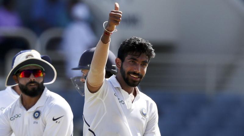 Bumrah wreaked havoc in the 9th over as he registered a hat-trick, and, with this, he became only the third Indian after Harbhajan Singh and Irfan Pathan to achieve the feat in the longest format of the game. (Photo: AP) Bumrah wreaked havoc in the 9th over as he registered a hat-trick, and, with this, he became only the third Indian after Harbhajan Singh and Irfan Pathan to achieve the feat in the longest format of the game. (Photo: AP)