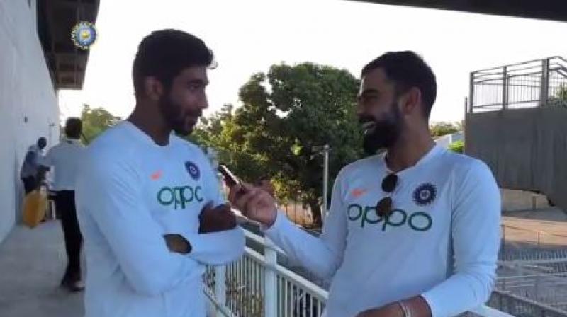 Jasprit Bumrah, who took his maiden Test hat-trick against West Indies, has attributed his feat to skipper Virat Kohli as his third wicket came on the Decision Review System (DRS), which Kohli took. (Photo: Twitter/ Screengrab) Jasprit Bumrah, who took his maiden Test hat-trick against West Indies, has attributed his feat to skipper Virat Kohli as his third wicket came on the Decision Review System (DRS), which Kohli took. (Photo: Twitter/ Screengrab)