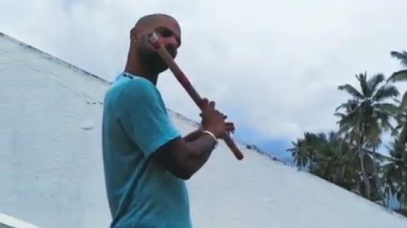 The India opener posted a video of him playing the flute on his Instagram handle. (Photo: Instagram/ screengrab) The India opener posted a video of him playing the flute on his Instagram handle. (Photo: Instagram/ screengrab)