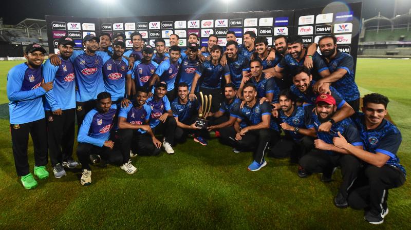Bangladesh got a hand on the trophy of a Twenty20 tournament involving more than two teams for the first time in their history. (Photo: AFP) Bangladesh got a hand on the trophy of a Twenty20 tournament involving more than two teams for the first time in their history. (Photo: AFP)