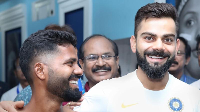 Behra has covered himself with Virat Kohli-related tattoos on his back and on his chest. (Photo: PTI) Behra has covered himself with Virat Kohli-related tattoos on his back and on his chest. (Photo: PTI)