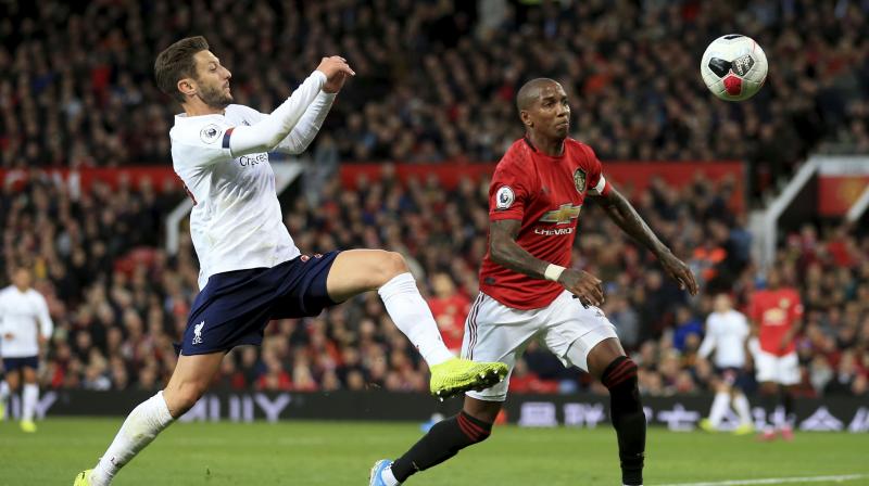 Liverpool substitute Adam Lallana grabbed an equaliser for the league leaders to cancel out Marcus Rashford’s 36th-minute opener. (Photo: AP) Liverpool substitute Adam Lallana grabbed an equaliser for the league leaders to cancel out Marcus Rashford’s 36th-minute opener. (Photo: AP)