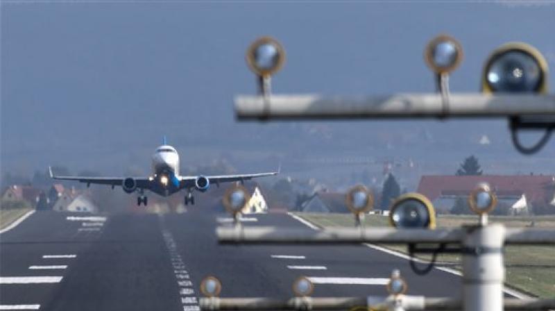 An airplane from the regional airline People's Viennaline takes off from the airport on Lake Constance in Friedrichshafen, Germany. (Photo: AP) An airplane from the regional airline People's Viennaline takes off from the airport on Lake Constance in Friedrichshafen, Germany. (Photo: AP)