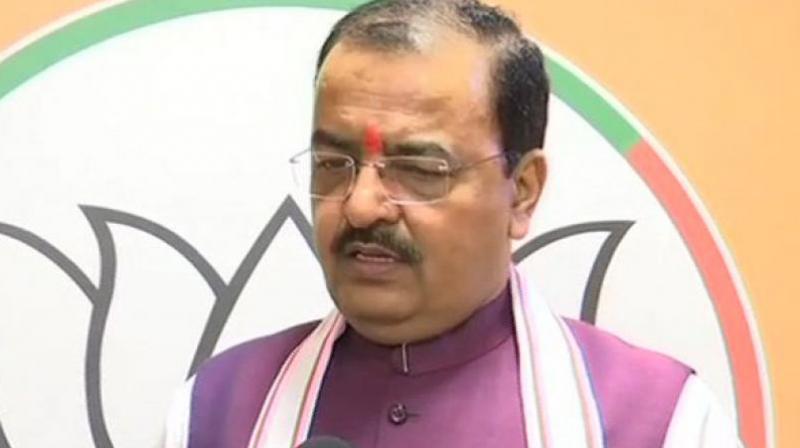 Uttar Pradesh Deputy CM Keshav Prasad Maurya said BJP has a majority in Lok Sabha, but don't have the numbers in Rajya Sabha to pass a bill for construction of Ram temple in Ayodhya. (Photo: ANI) Uttar Pradesh Deputy CM Keshav Prasad Maurya said BJP has a majority in Lok Sabha, but don't have the numbers in Rajya Sabha to pass a bill for construction of Ram temple in Ayodhya. (Photo: ANI)