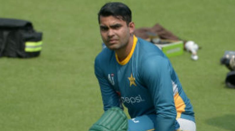 An PCB official said the show cause had been issued since Umar had breached clauses of his player's contract which bars any player from talking to the media without first taking permission from the authorities.(Photo: AFP) An PCB official said the show cause had been issued since Umar had breached clauses of his player's contract which bars any player from talking to the media without first taking permission from the authorities.(Photo: AFP)