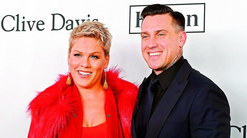 Songster Pink’s husband, Carey Hart Songster Pink’s husband, Carey Hart
