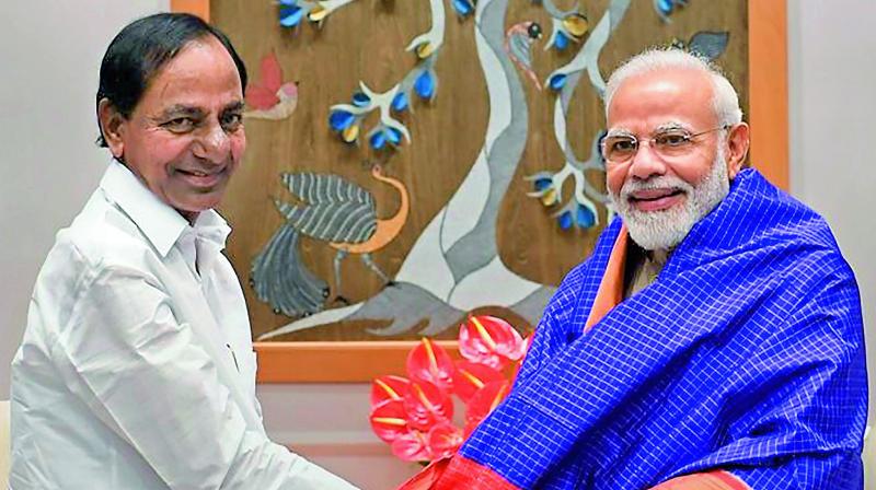 Telangana Chief Minister K. Chandrashekar Rao meets Prime Minister Narendra Modi in New Delhi on Friday. (PTI) Telangana Chief Minister K. Chandrashekar Rao meets Prime Minister Narendra Modi in New Delhi on Friday. (PTI)