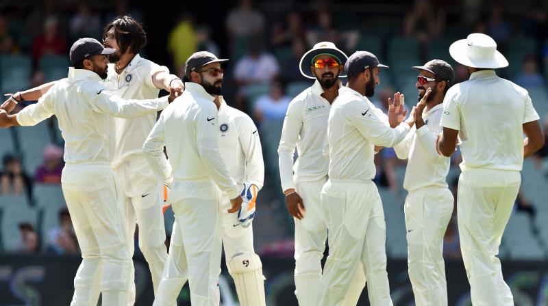 India won their first Test on Australian soil in a decade Monday, bowling out the home side in a nail-biting finale to clinch the opening match of the series at Adelaide Oval. (Photo: AFP) India won their first Test on Australian soil in a decade Monday, bowling out the home side in a nail-biting finale to clinch the opening match of the series at Adelaide Oval. (Photo: AFP)