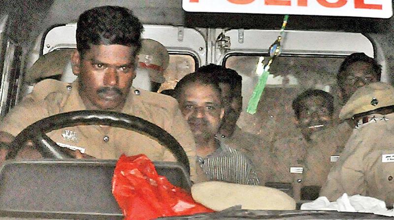 Perarivalan moves out of prison in police vehicle. (Photo: DC) Perarivalan moves out of prison in police vehicle. (Photo: DC)