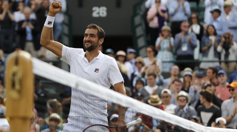Marin Cilic celebrates after beating Luxembourg's Gilles Muller at the end of their Men's Singles Quarterfinal Match. (Photo:AP) Marin Cilic celebrates after beating Luxembourg's Gilles Muller at the end of their Men's Singles Quarterfinal Match. (Photo:AP)