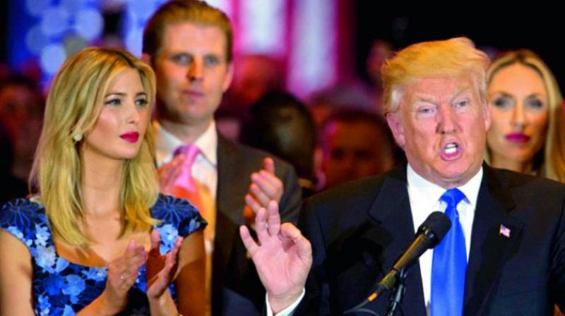 Republican presidential candidate Donald Trump is joined by his daughter Ivanka and son Eric. (Photo: AP) Republican presidential candidate Donald Trump is joined by his daughter Ivanka and son Eric. (Photo: AP)