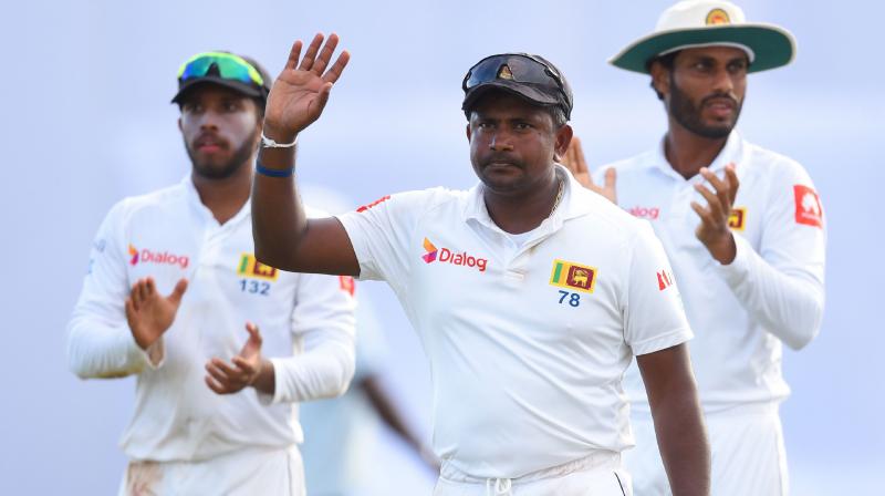 Last man out was silver fox Rangana Herath, cricket's most successful left-arm spinner in history, in his last match before retirement. (Photo: AFP) Last man out was silver fox Rangana Herath, cricket's most successful left-arm spinner in history, in his last match before retirement. (Photo: AFP)