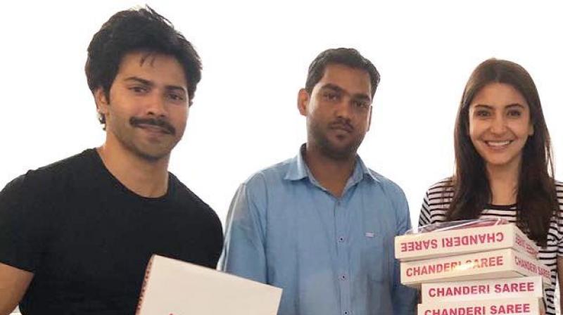 Varun Dhawan and Anushka Sharma pose with Chanderi sarees. Varun Dhawan and Anushka Sharma pose with Chanderi sarees.