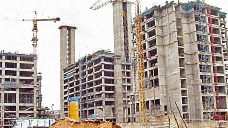 'Total wealth of the top 100 real estate developers stood at Rs 2,36,610 crore in 2018, up 27 per cent from Rs 1,86,700 crore in 2017,' says the Hurun-Grohe India (German sanitary ware maker) rich-list 2018. (Representational Image) 'Total wealth of the top 100 real estate developers stood at Rs 2,36,610 crore in 2018, up 27 per cent from Rs 1,86,700 crore in 2017,' says the Hurun-Grohe India (German sanitary ware maker) rich-list 2018. (Representational Image)