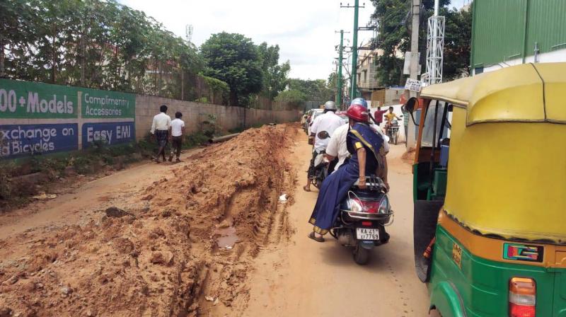 BWSSB pipeline work is causing inconvenience to commuters and motorists in Ittamadu main road, which provides a short cut between Kathriguppe and Uttarahalli (Photo: DC) BWSSB pipeline work is causing inconvenience to commuters and motorists in Ittamadu main road, which provides a short cut between Kathriguppe and Uttarahalli (Photo: DC)