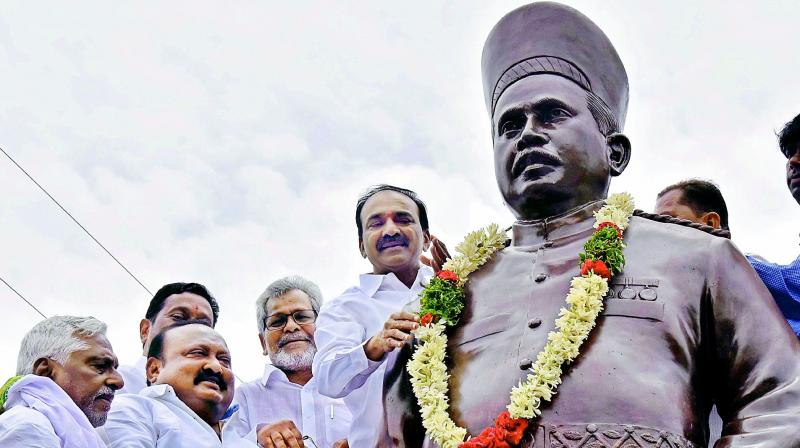 Minister Etala Rajender inaugurated the statue of Raja Bahadur Venkatarami Reddy in front of SRR Degree and PG College in Karimnagar on Sunday. Minister Etala Rajender inaugurated the statue of Raja Bahadur Venkatarami Reddy in front of SRR Degree and PG College in Karimnagar on Sunday.