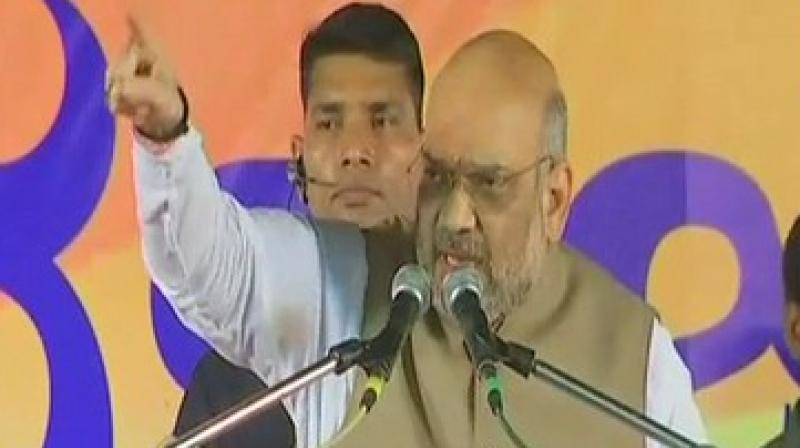 Shah claimed that Karnataka under the Siddaramaiah government had become one with widespread farmer suicides, atrocities against women and unemployment. (Photo: ANI) Shah claimed that Karnataka under the Siddaramaiah government had become one with widespread farmer suicides, atrocities against women and unemployment. (Photo: ANI)